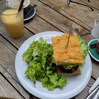 Quinoa burger and banana-orange smoothie at Simbio in Bucharest