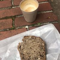 Coffee with coconut milk and banana bread   at ST. LOUIS The Breakfast Company in Cologne