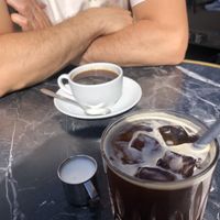 Americano and iced decaf version with oat milk   at ST. LOUIS The Breakfast Company in Cologne