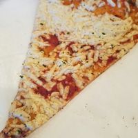 plain vegan Daiya slice, well done, nice and crispy   at Purgatory Pizza in Los Angeles