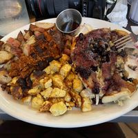 Vegan Usual w blueberry pancakes, tofu egg, soyriso and potatoes. So good!  at Millie's Cafe in Los Angeles