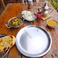Saag paneer, daal, garlic naan, chai at Om Cafe in Bocas Del Toro