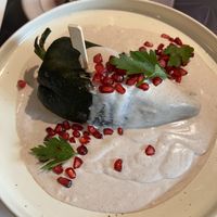 Delicious Chile en Nogada, filled in with mushrooms and all the traditional recipe but vegan!! 😋  at Garabatos - ABC Hospital in Mexico City