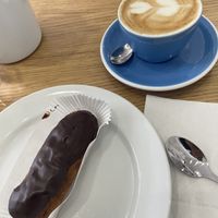 Éclair and cappuccino   at Cloud Cakes -  Notre Dame de Lorette in Paris