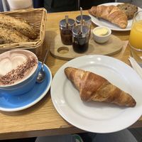 Cloud breakfast: Croissant and bread with jams , chocolate spread and vegan butter. Hot chocolate and orange juicee  at Cloud Cakes -  Notre Dame de Lorette in Paris