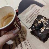 Almond bar + espresso at AUH - Costa Coffee - T3 in Abu Dhabi