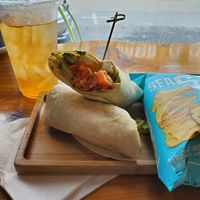 Veggie hummus wrap with chips, green mint tea at Molly's Courtyard Cafe of Marietta in Marietta