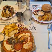 Tortilla de papa, milanesa napolitana, sandwich de girgolas at Gordo Vegano in Buenos Aires