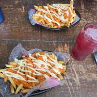 Papas con alioli    at Lado V in Buenos Aires