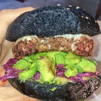 Burger with beetroot/mushroom/oat patty, vegan cream cheese, avocado and pickled veggies. Delicious   at SUSU Vegan Mylk Bar Penang in Penang