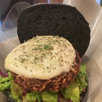 Burger with beetroot/mushroom/oat patty, vegan cream cheese, avocado and pickled veggies. Delicious   at SUSU Vegan Mylk Bar Penang in Penang