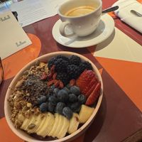 Oat latte and  Açaí bowl from little coffee shop off lobby  at Lido Restaurant and Bayside Grill in Miami Beach