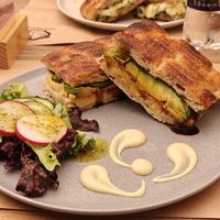 Avocado and hummus sandwich. The white sauce at the front of the plate is NOT vegan at Masamama Bakery and Mill in Arequipa