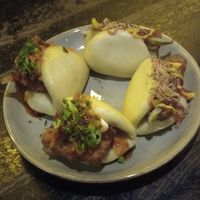 Firecracker tofu bao (left), vegan hotdog bao (right) at Wolf at the Door in Manchester