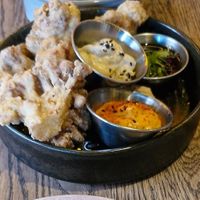 karaage cauliflower: crispy fried cauliflower, triple dips (ve) at Wolf at the Door in Manchester