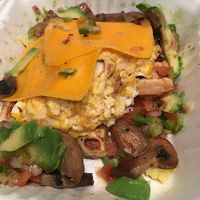 One of the few non-vegan food items I'll post (it's vegetarian): just to show you how messed up this place is. I asked a vegan dish and they put cheese and scrambled eggs. at La Desayunería in Madrid