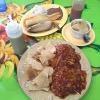 All vegan! Burrito with sauce & vegan cheese, 2 tamale plate, one spinach/mushroom the other jalapeño/queso with rice & beans and tortilla soup. This was so much food!  at Mama's International Tamales in Los Angeles