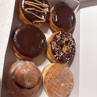 Peanut butter filled, white cream filled, cholocate cream filled, chocolate glaze with sprinkles, cinnamon roll, cinnamon sugar  at Golden Harvest Bakery & Cafe in Rochester