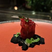Candied hibiscus on charcoal chestnut. Part of set menu “Vietnam” (950k VND)  at Cổ Đàm Chay in Hanoi