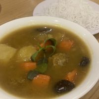 Curry and noodles  at Bánh mí Vegan Vietnam in Hanoi