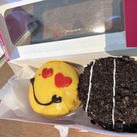 two cream filled donuts  at Dunkin' - Stationsplein in Amsterdam