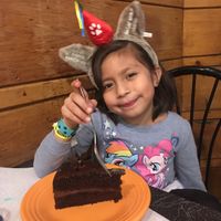 birthday girl with Glorious Chocolate Cake at The Cheeze Factory Restaurant in Baraboo