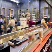 Window and counter  at Fitzkey Chimney Cake - Food Stand in Budapest
