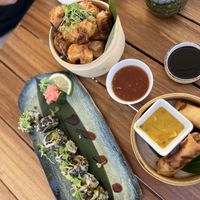 Sushi, cauliflower wings and spring rolls  at Antasia Beach Club in Paphos