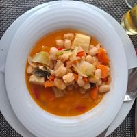Estufado Caseiro (bean stew), Fried Polenta cubes & chips at Pólo Norte in Porto Moniz