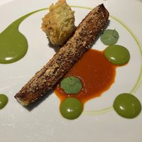 Hazelnut and pistachio encrusted zucchini, squash blossom stuffed with chanterelles at Opasly Tom in Warsaw