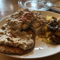 Impossible chicken fried steak, mashed potatoes with mushroom gravy and biscuits and gravy   at Sweet Melissa Cafe in Laramie