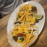 Mole tacos… swapped out some “egg-based chicken” for cauli and it was good!   at Sweet Melissa Cafe in Laramie