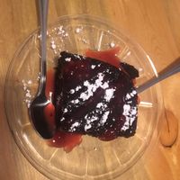 Vegan chocolate cake with raspberry sauce   at Sweet Melissa Cafe in Laramie