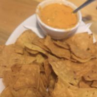 Delicious cashew queso with warm chips...so good.  at Sweet Melissa Cafe in Laramie