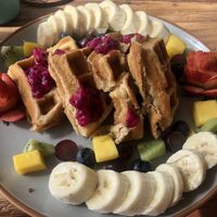 Vegan Waffles with Pitaya drizzle at Eduardos Hideaway in Noord