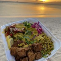 Eduardo’s special bowl with tahini sauce, crispy tofu and quinoa   at Eduardos Hideaway in Noord