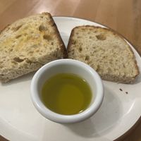 Sourdough toast with olive bread  at Eduardos Hideaway in Noord