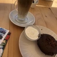 Latte and vegan chocolate cake   at Loja do Chá in Funchal