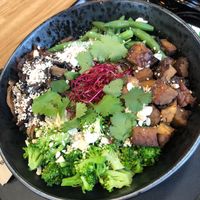 Buddha broccoli bowl with rice noodles, tempeh, mushrooms and peanut sauce  at Forky's - Ostrava in Ostrava