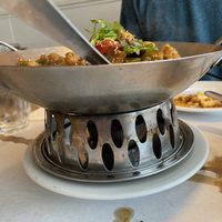 Fire underneath clay pot at Da Sichuan Bistro in Palo Alto