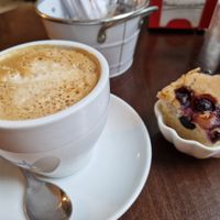 Café con soja y bizcocho vegano con arándanos at Pasiones Bar  in Gijon