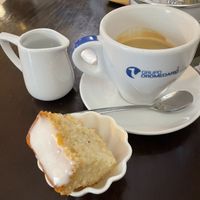 Café americano with iced lemon sponge   at Pasiones Bar  in Gijon