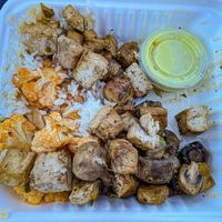 Mahana bowl with garlic tofu, Buffalo cauliflower, roasted mushrooms and a coconut sweet potato sauce. Light and flavorful!  at Mahana Fresh in Idaho Falls