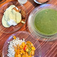 Spinach soup. Main dishes were a soy meat thing with mashed potato and creamy sauce, and a sweet and sour tofu with rice.  at Tulasi in Cochabamba