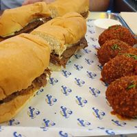 Pastrami sandwich and wings. at Jimmy's Street Food in Paris