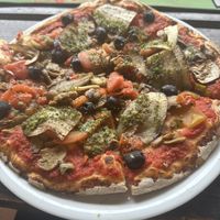  Vegetarian pizza, no cheese, added olives and eggplant  at Allo Pizza in Moorea