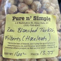 $13 bag of hazelnuts with a Bible verse on their pre-printed labels at Pure N Simple in Glens Falls