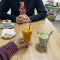 Juice and matcha latte   at 100 Culpa in Porto