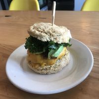 Bacon, egg, cheese, avo, kale, on a biscuit.  at Dulce Vegan Bakery and Cafe in Atlanta