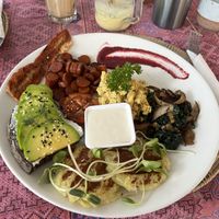 Full Breakfast with bacon, sausage, hash brown patties, avocado toast, scrambled eggs, seasoned tomato, and mushroom/greens mix.  at Soul Phuket in Phuket